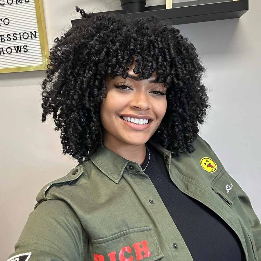 20 Playful Curly Hair Ideas! 4 Medium Fluffy Spiral Curls With Long Bangs