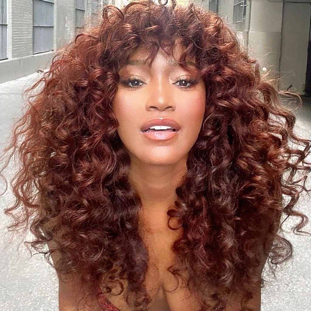 Curly Reddish Purple Brown Hair With Curly Wispy Fringes