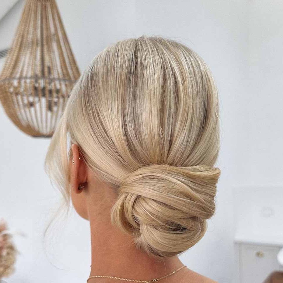 15 Stunning Bun Hairstyles for Elegance! 6 Soft Texture Easy Low Bun