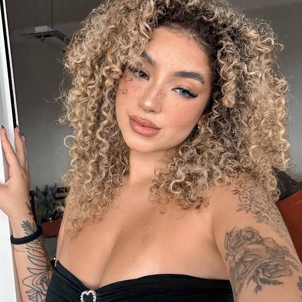 20 Playful Curly Hair Ideas! 8 Blonde Layered Corkscrew Curls