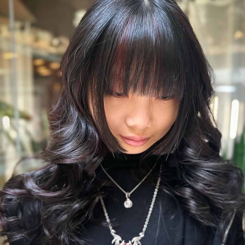 15 Stylish Hime Haircut Ideas! 12 Layered Wavy Hime Cut With Maroon Highlights and Long Choppy Bangs