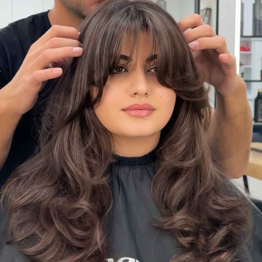 15 Retro 90s Blowout Hairstyles! 14 Layered Blowout Hair With Face-Framing Layers and Bangs