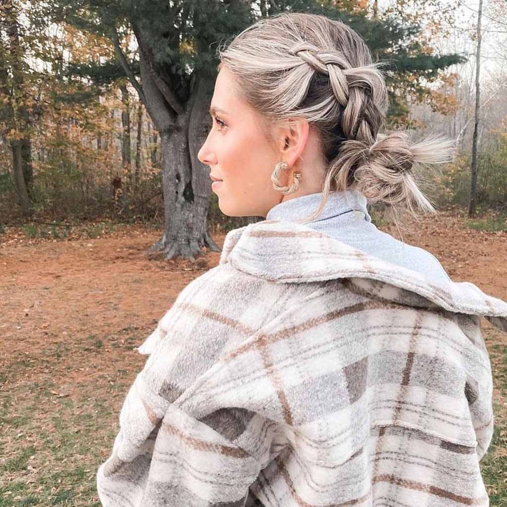 15 Stunning Bun Hairstyles for Elegance! 15 Ash Blonde Side Braided Bun