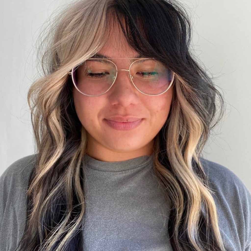20 Stylish Hairstyles With Chunky Highlights! 15 Platinum Blonde Color Blocking on Wavy Wolf Cut
