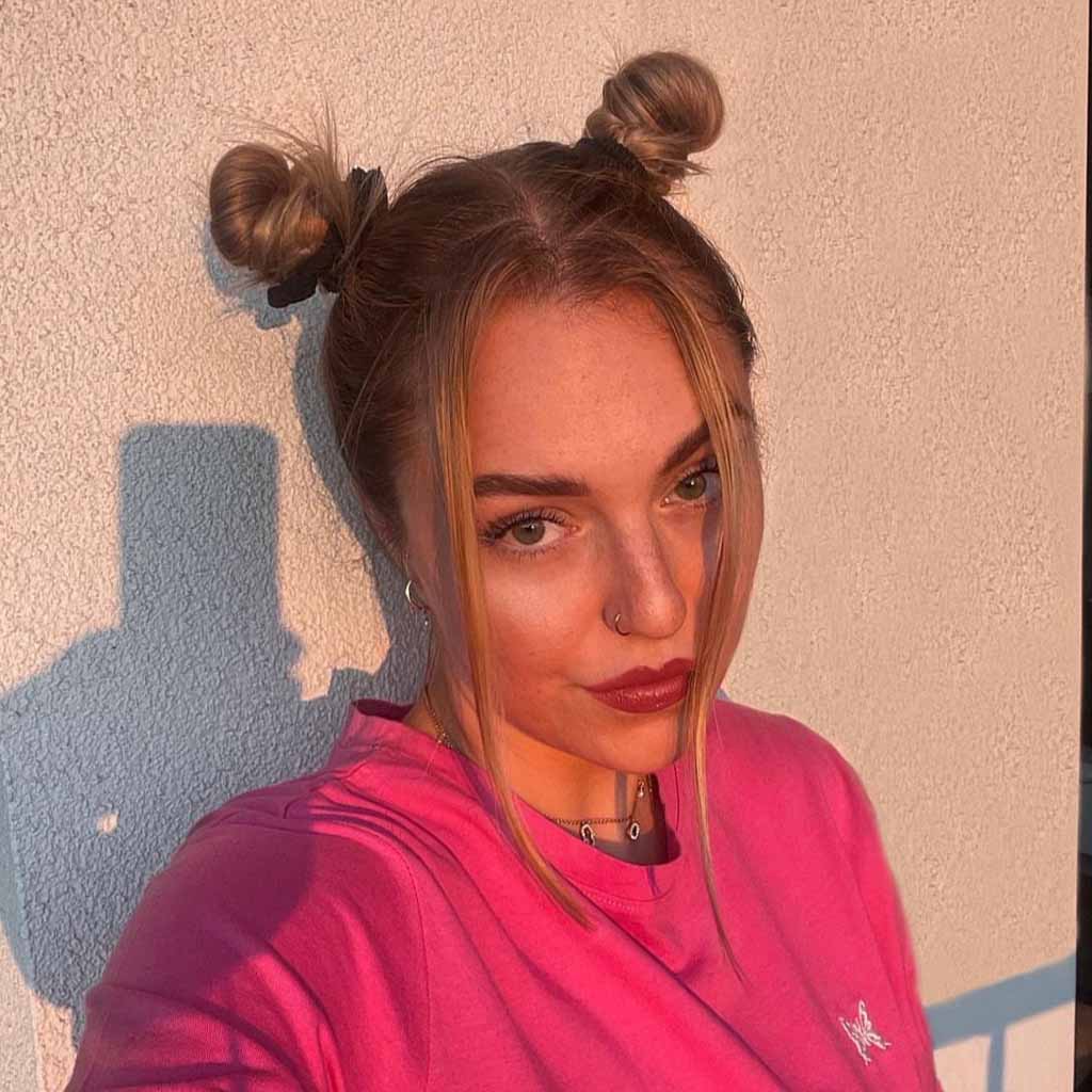 15 Stunning Bun Hairstyles for Elegance! 16 Brown Space Buns With Tendrils
