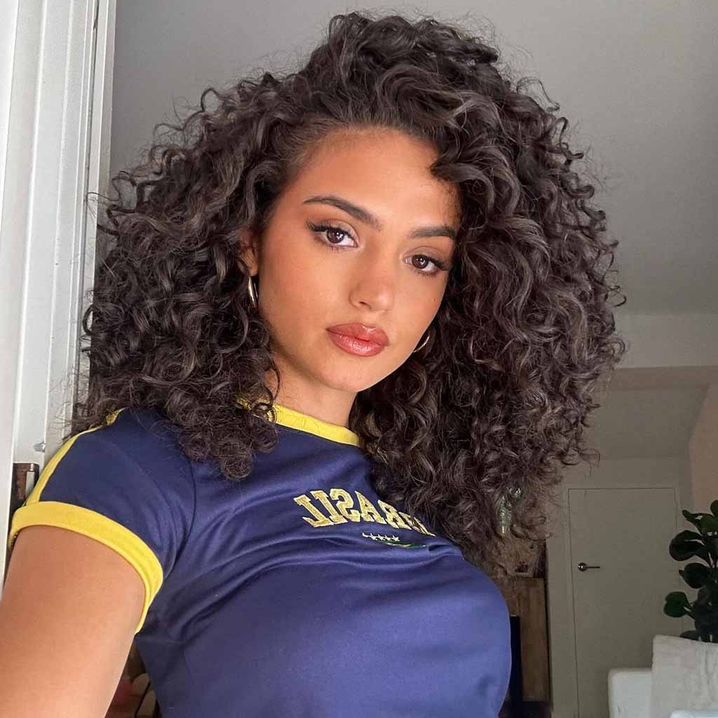 20 Playful Curly Hair Ideas! 17 Medium Side-Parted Classic Fluffy Curls