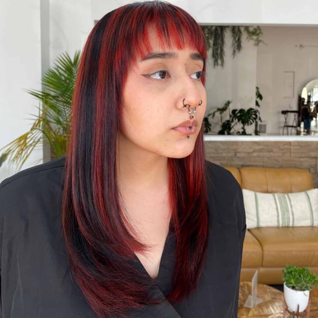 20 Stylish Hairstyles With Chunky Highlights! 18 Bright Red Chunky Highlights on Layered Hair With Short Bangs