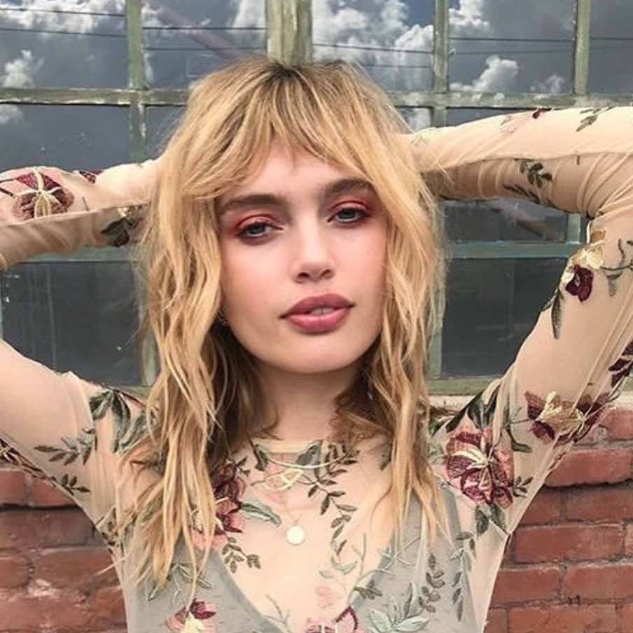 Blonde Textured Shag Cut With Wispy Bangs