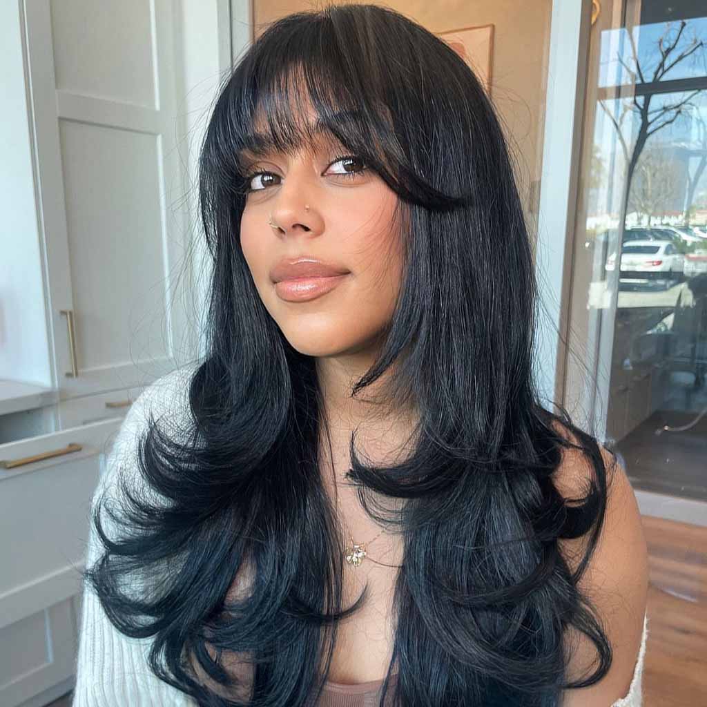 Long Face Framing Layers and Wispy Bangs on Black Hair
