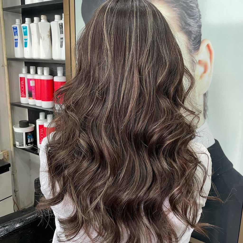 15 Sassy Hairstyles With Streaky Highlights! 15 Messy Tousled Dark Brown Hair With Platinum Streaks
