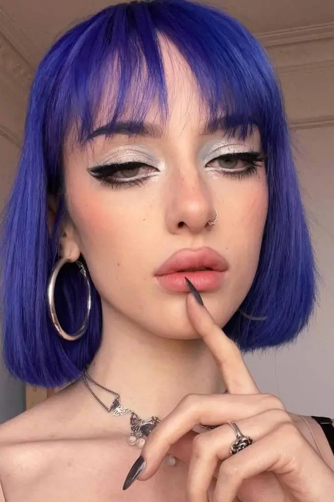 12 Bold Hair Dye Ideas for Women 11 Vibrant Violet Short Hair With Bangs 1