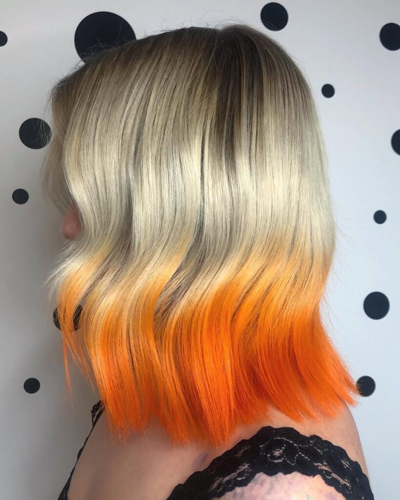 12 Fancy Dip-Dye Hair Color Ideas 2 Wavy Blonde Bob Hair With Orange Tips 819x1024 2