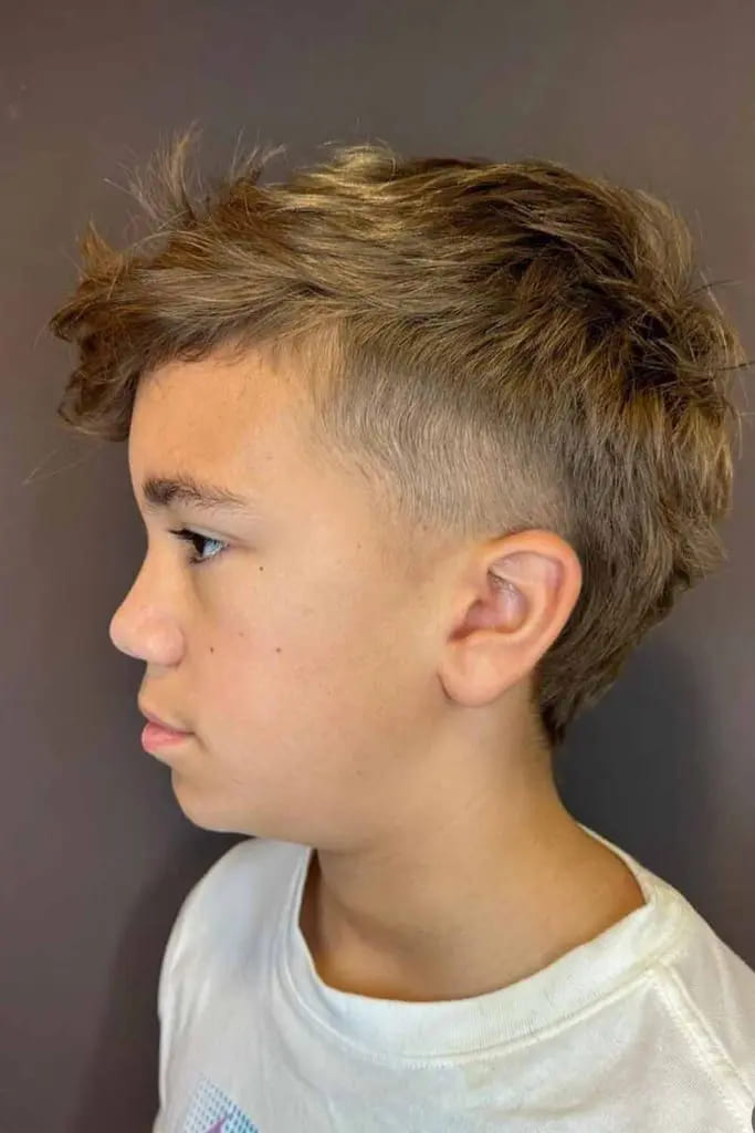 12 Charming Haircuts for Boys 7 Wavy Bronde Mullet Haircut